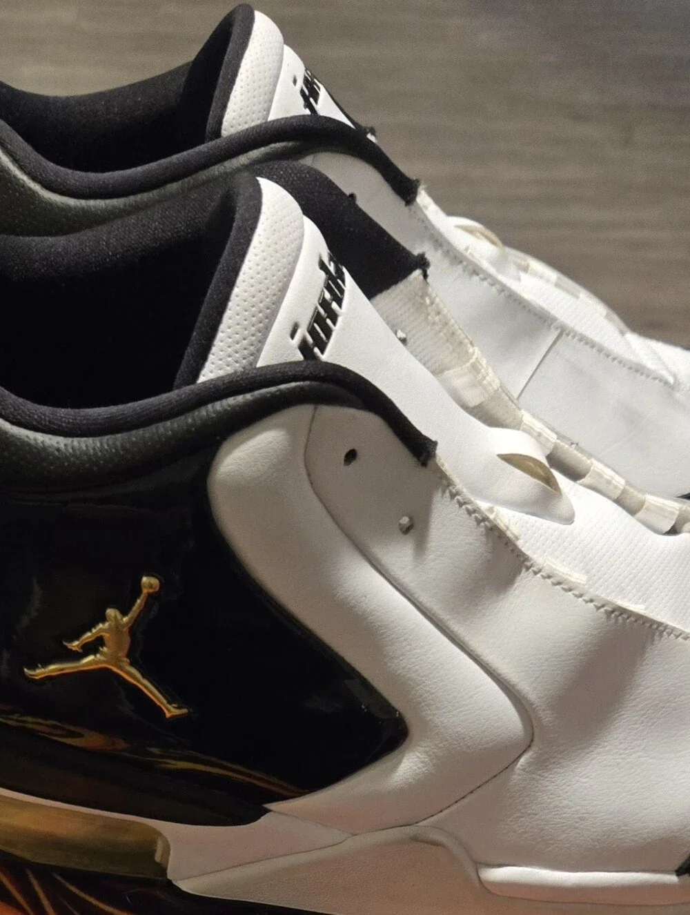 Jordan Men's Athletic Shoes in Black and Metallic Gold Heel